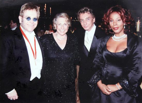 Sir Elton John: A colour photograph of Elton John, his mother Sheila Farebrother, Barry Manilow and Donna Summer, 8 x 10in.